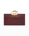 Alexander Mcqueen Four-ring Stamped Crocodile Clutch Bag In Madder