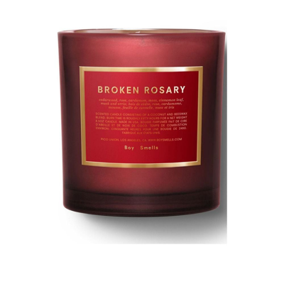 Boy Smells Red Broken Rosary Candle In Neutral
