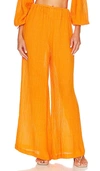 Faithfull The Brand Rupina Flare Leg Crinkle Pants In Tangerine
