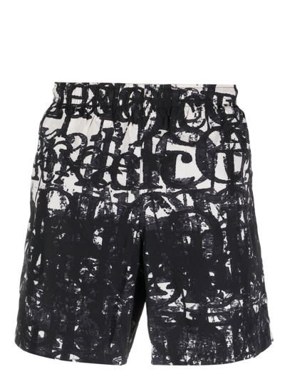 Alexander Mcqueen Men's Stamp-print Swim Shorts In Multi