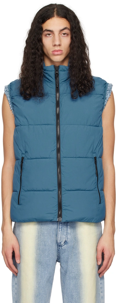 The Very Warm Blue Puffer Waistcoat In Blue Steel