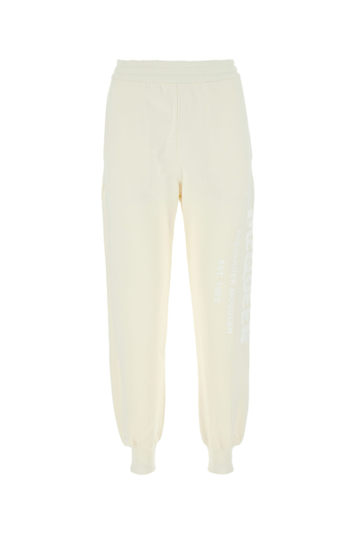 Alexander Mcqueen Graffiti Print Cotton Joggers In Beige