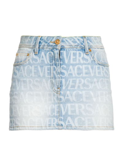 Versace All Over Logo Print Cotton Denim Shorts In Light Blue