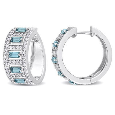 Amour 3 1/3ct Tgw Baguette London Blue Topaz And White Topaz Huggie Hoop Earrings In Sterling Silver