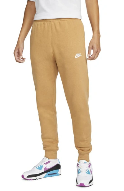 Nike Club Pocket Fleece Joggers In Gold