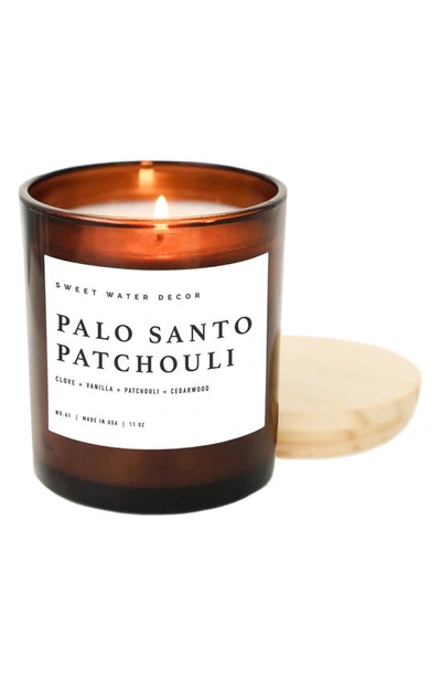 Sweet Water Decor Palo Santo Patchouli 11 Oz. Candle In Black