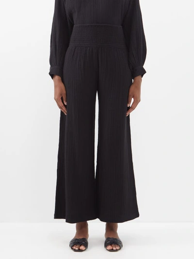 Anaak Maya Shirred-waist Cotton-muslin Wide-leg Trousers In Black