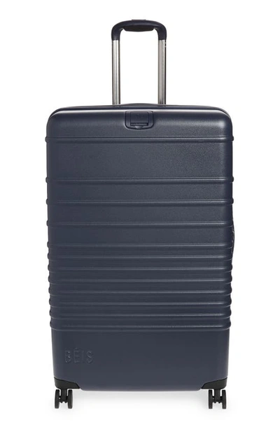 Beis The 29-inch Rolling Spinner Suitcase In Navy