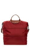Longchamp Le Pliage Expandable Travel Bag In Red