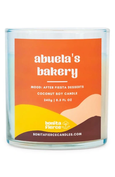 Bonita Fierce Abuela's Bakery Candle In White/ Orange