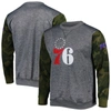 FANATICS FANATICS BRANDED HEATHER CHARCOAL PHILADELPHIA 76ERS CAMO STITCHED SWEATSHIRT