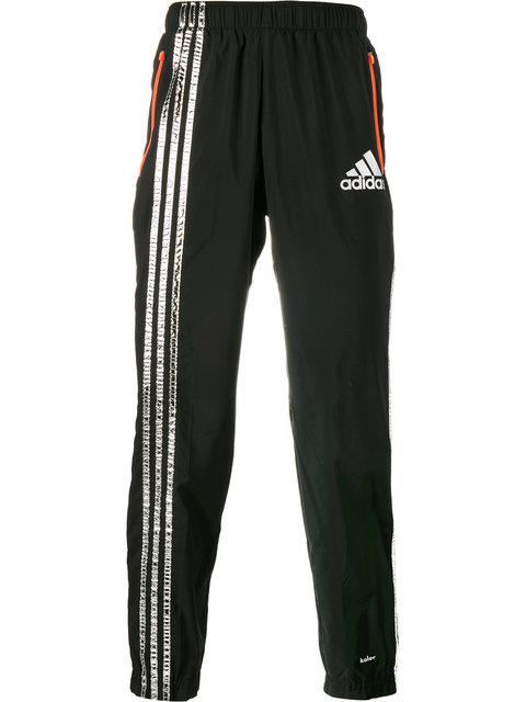 track pants black and yellow