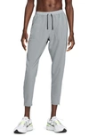 Nike Dri-fit Phenom Woven Running Pants In Smoke Grey/ Reflective Silver