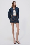 Simkhai Magali Quilted Denim Miniskirt In Washed Indigo