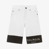 BALMAIN BOYS WHITE DENIM LOGO SHORTS