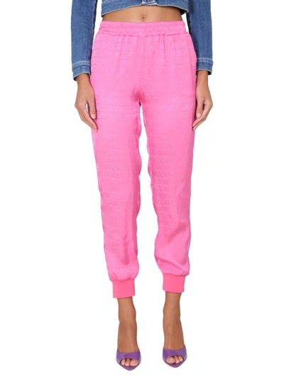 Moschino Monogram-print Joggers In Pink