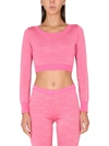Moschino Cropped Pullover With Allover Logo Pattern In Pink