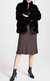Apparis Skylar Faux Fur Tiered Short Coat In Black