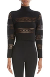 ALAÏA VIENNE PERFORATED CROP TURTLENECK SWEATER