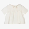 1+ IN THE FAMILY 1 + IN THE FAMILY BABY GIRLS IVORY DRESS