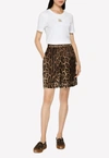 Dolce & Gabbana Animalier Printed Silk Shorts In Brown