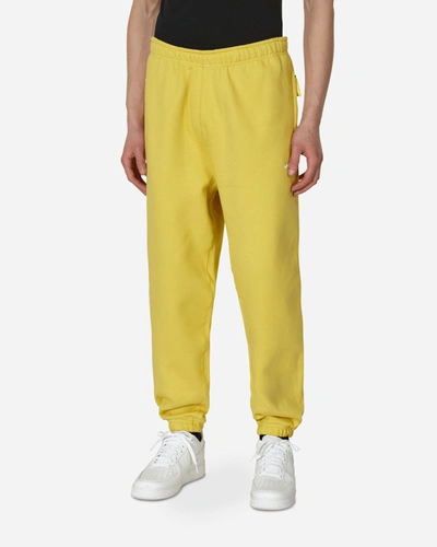 Nike Men's Solo Swoosh Fleece Trousers In Yellow