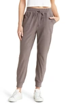 Beyond Yoga Spacedye Commuter Midi Joggers In Woodland Heather