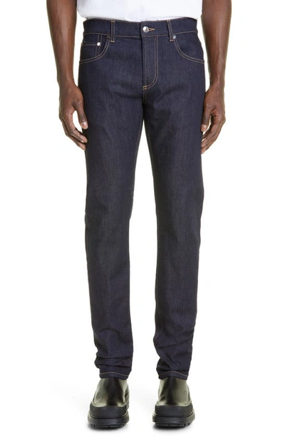 Alexander Mcqueen Studded Logo Slim-fit Jeans In Grey