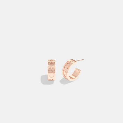 Coach Outlet Signature Huggie Earrings In Yellow
