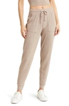 Alo Yoga Soho Sweatpants In Taupe