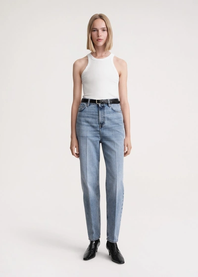 Totême Tapered Leg Denim Jean In Worn Blue