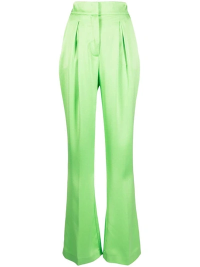 Genny Pleat-detail Flared Trousers In Green