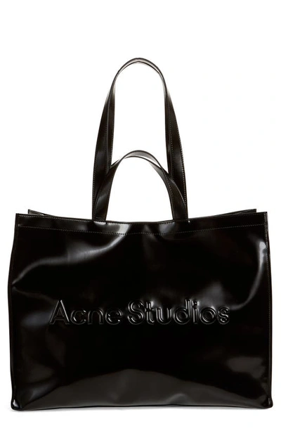 Acne Studios Logo Embossed Faux Leather East/west Tote In Black