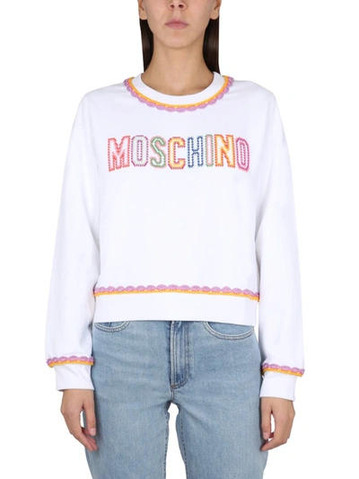 Moschino Logo Printed Crewneck Sweatshirt In White