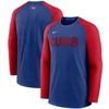 NIKE NIKE ROYAL/RED CHICAGO CUBS AUTHENTIC COLLECTION PREGAME PERFORMANCE RAGLAN PULLOVER SWEATSHIRT