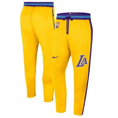 Nike Men's  Gold Los Angeles Lakers 2021/22 City Edition Therma Flex Showtime Trousers