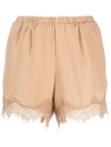 Gold Hawk Lace Inserts Shorts In Beige