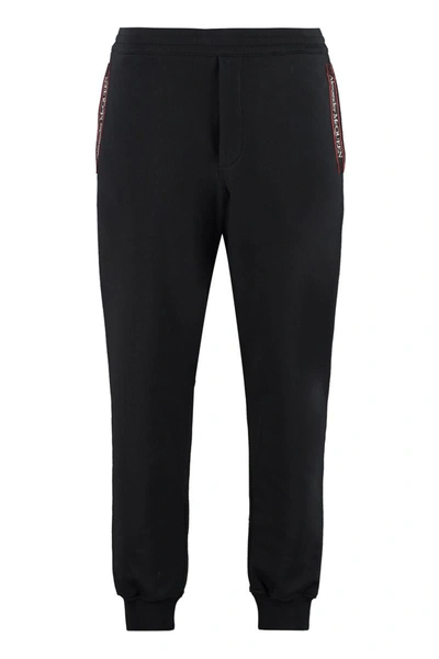 Alexander Mcqueen Tapered Logo Cotton Joggers In Black