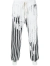 HAIDER ACKERMANN STRIPED TROUSERS,173382022200612038828