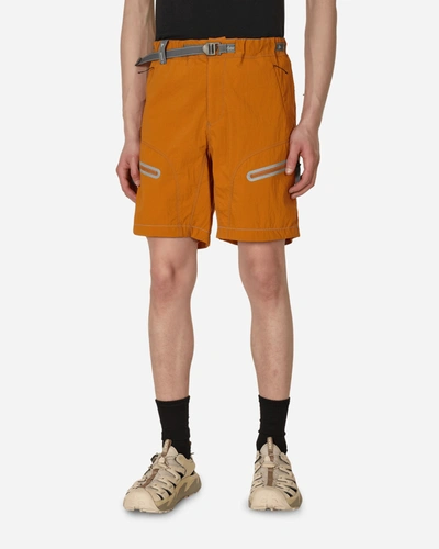 And Wander Light Hike Shorts In Orange