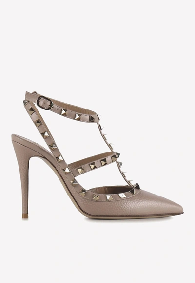 Valentino Garavani 100 Rockstud Leather Pumps In Beige