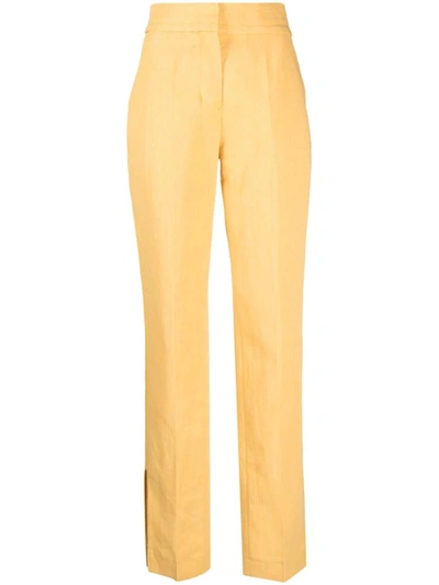 Jacquemus Tibau Split Linen-blend Pants In Yellow & Orange