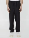Saint Laurent Tapered Shell Trousers In Black