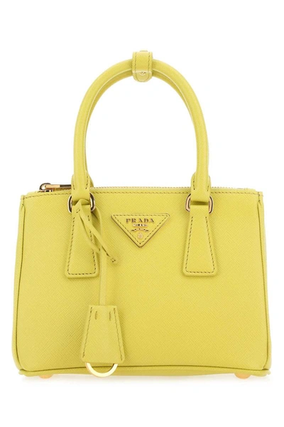 Prada Handbags. In Yellow