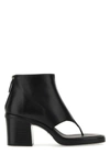 Miu Miu Leather Thong Ankle Boots In Black