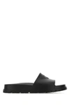 Prada 38 Logo Strap Lug-sole Leather Slides In Black