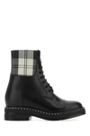 Chloé Leather Boots With Fabric Inserts And A Rounded Toe In Black