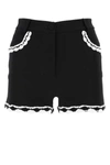 Moschino High-waist Lace-trim Buttoned Shorts In Black