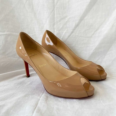 Pre-owned Christian Louboutin Nude Patent Leather Peep Toe Pumps, 37.5 In Used / 37.5 / Nude