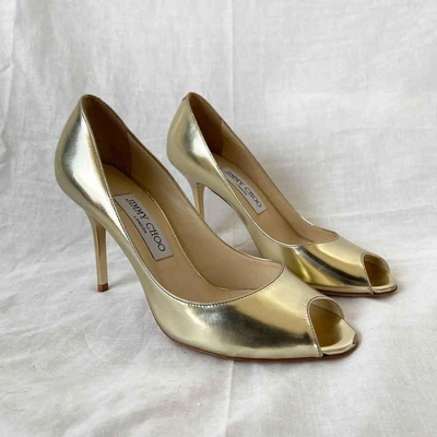 Pre-owned Jimmy Choo Gold Peep Toe Pumps, 37 In Used / 37 / Gold